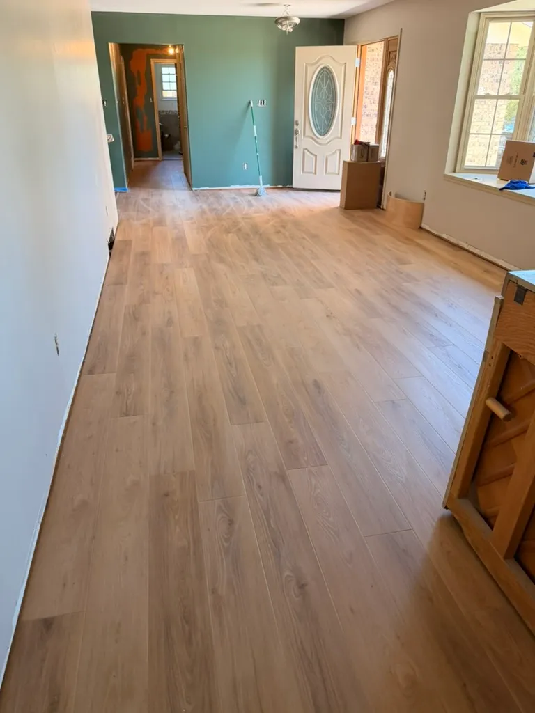 Long living room with new vinyl plank flooring