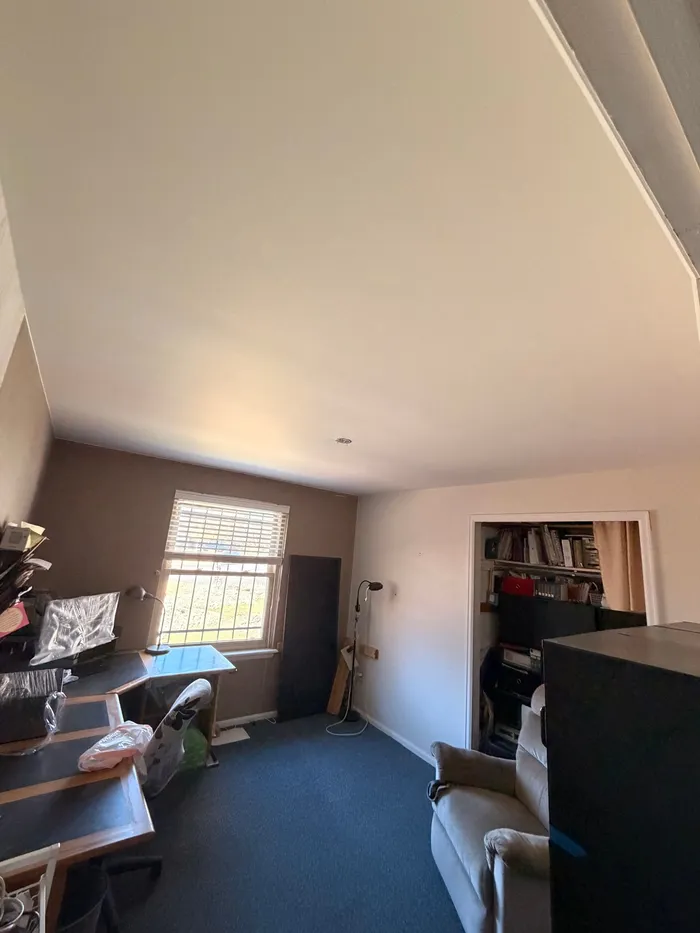 Same office with a smooth finished ceiling