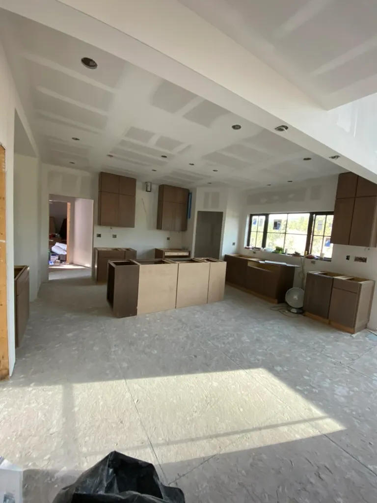 New kitchen with walls and ceiling taped